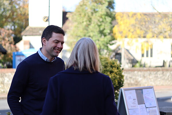 Chris Coghlan talking to a resident